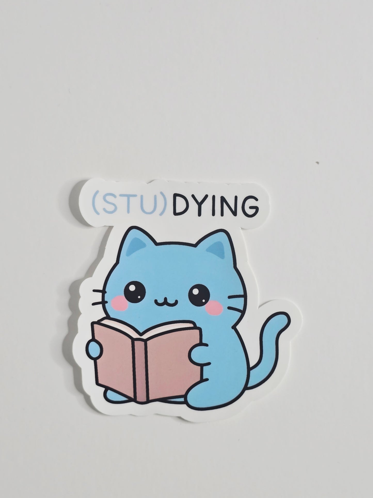 (STU)DYING Blue Cat Sticker – Funny Kawaii Study Cat Vinyl Sticker – 3" Die-Cut, Water-Resistant Student Gift