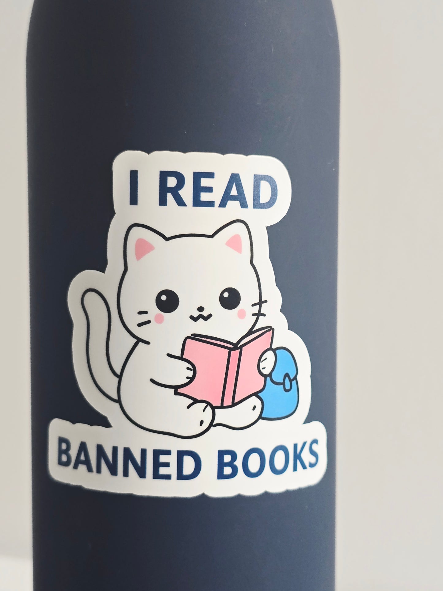 I Read Banned Books Sticker – Cute Cat Reading Vinyl Sticker – 3" Die-Cut, Water-resistant