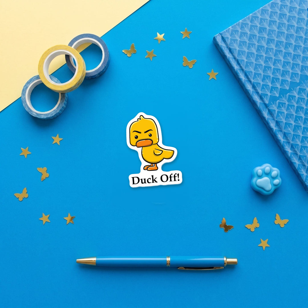 Duck Off 3 inch fridge magnet flat lay with blue stationery