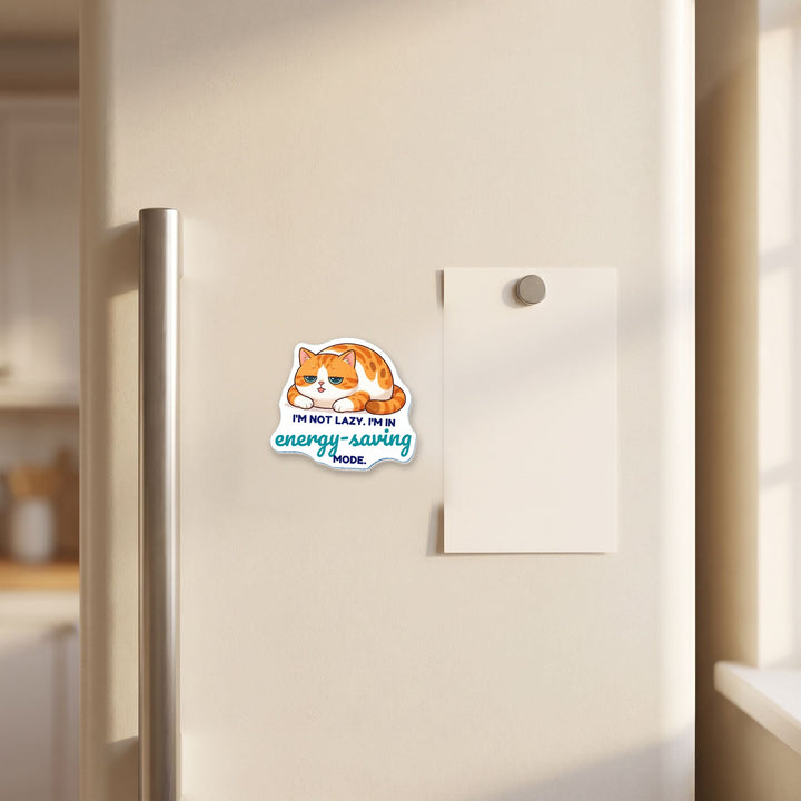 Energy Saving Mode Cat magnet on a refrigerator door