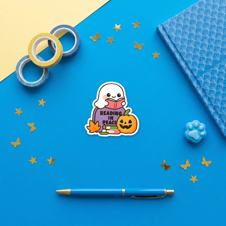 Reading in Peace kawaii 3 inch fridge magnet flat lay with blue stationery