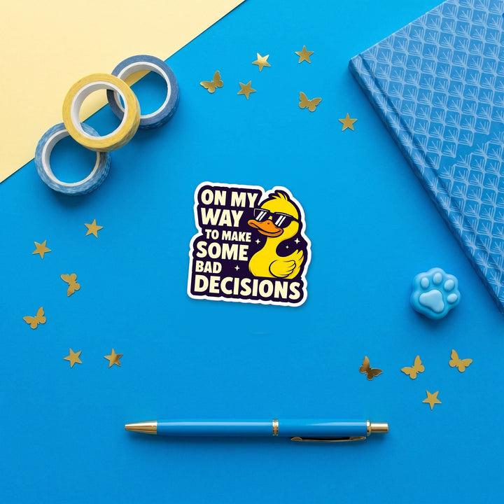 On My Way to Make Some Bad Decisions Duck 3 inch fridge magnet flat lay with blue stationery
