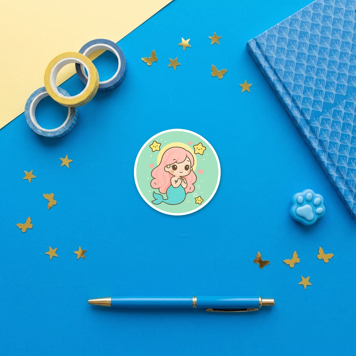 Pink Mermaid kawaii 3 inch fridge magnet flat lay with blue stationery