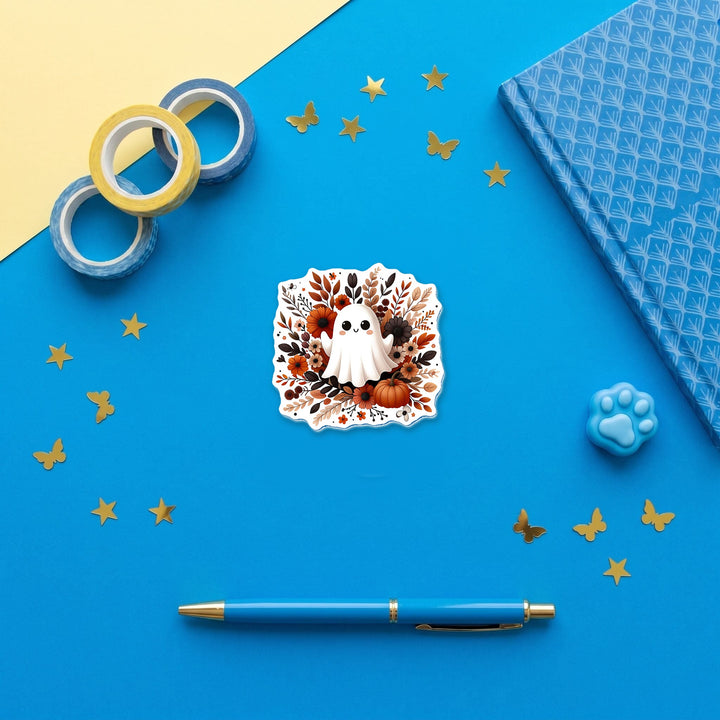 Cute Ghost with Floral Wreath 3 inch fridge magnet flat lay with blue stationery