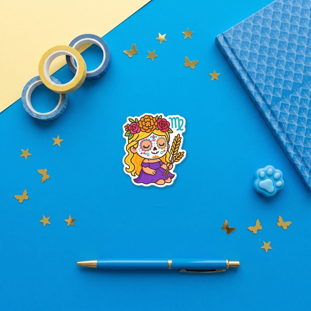 Virgo Sugar Skull Girl 3 inch fridge magnet flat lay with blue stationery