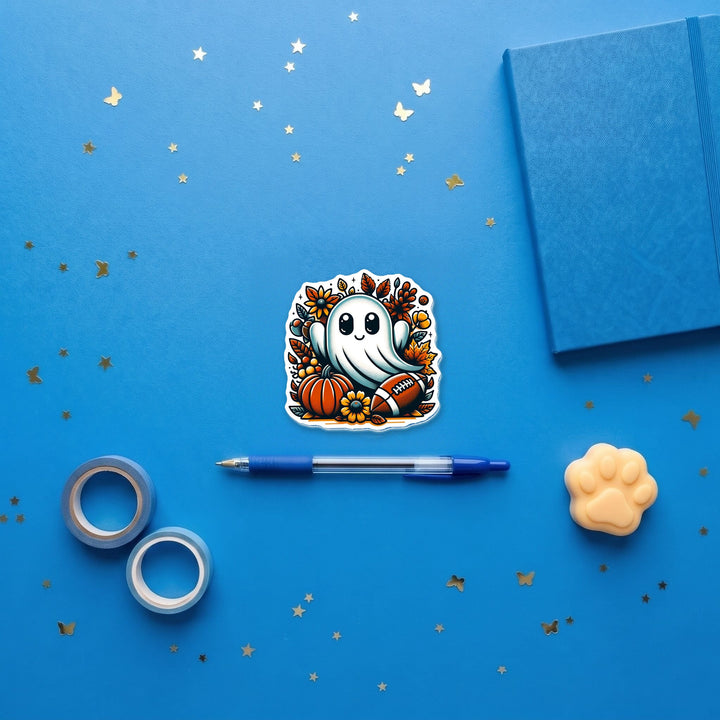 Football Fall Ghost 3 inch fridge magnet flat lay with blue stationery