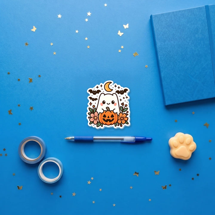 Cute Halloween Ghost 3 inch fridge magnet flat lay with blue stationery