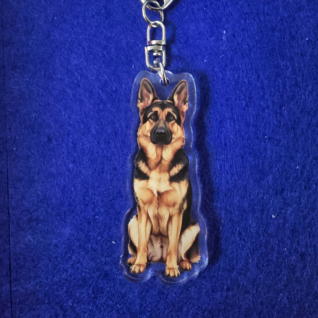 German Shepherd Sable Watercolor Style - Acrylic Keychain on a blue background