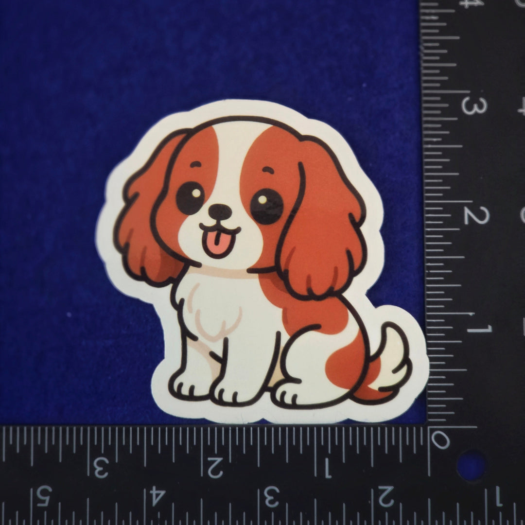 Cartoon dog sticker on a blue background with a ruler for scale.