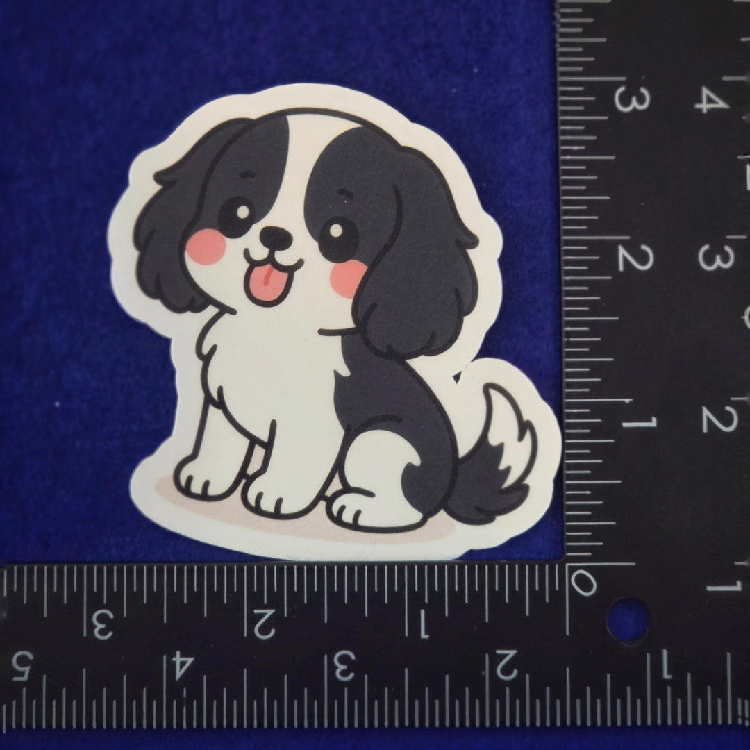 Sticker of a cartoon dog with a ruler for scale on a blue background