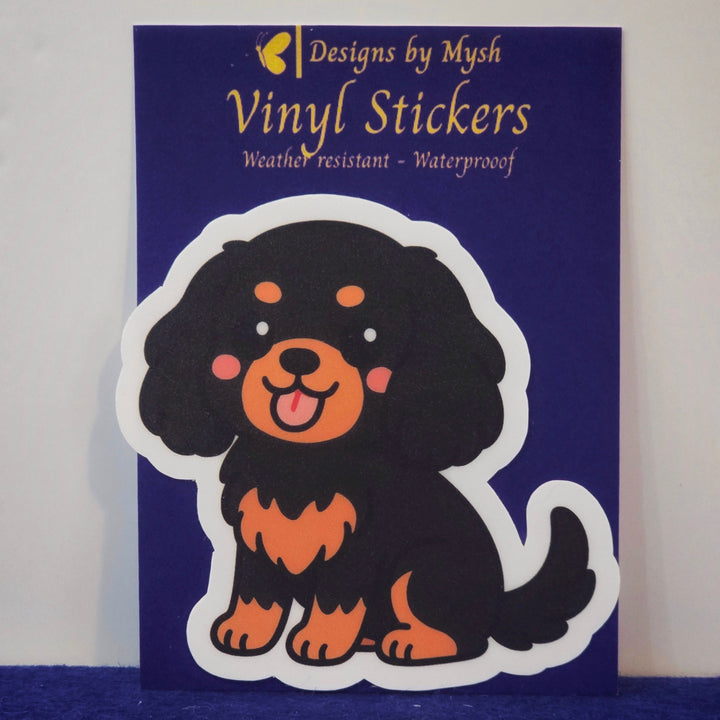 Vinyl sticker of a dog on a blue card with &