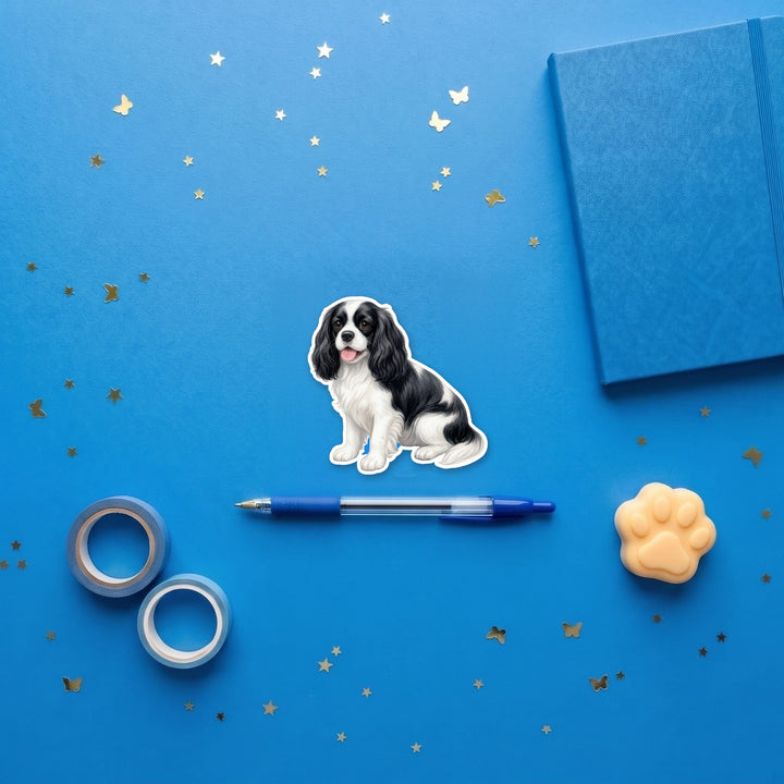 Cavalier King Charles Spaniel Black and White watercolor 3 inch fridge magnet flat lay with blue stationery