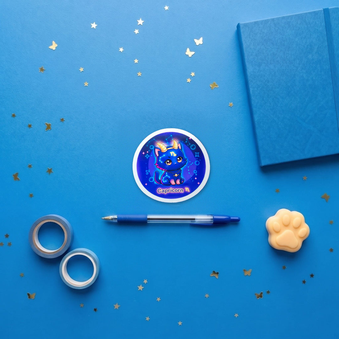Zodiac Capricorn Cat 3 inch fridge magnet flat lay with blue stationery