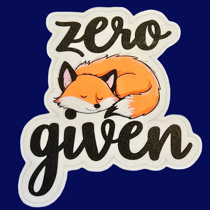A vinyl decal sticker with a cartoon fox sleeping and the text 'zero given' in a playful font.
