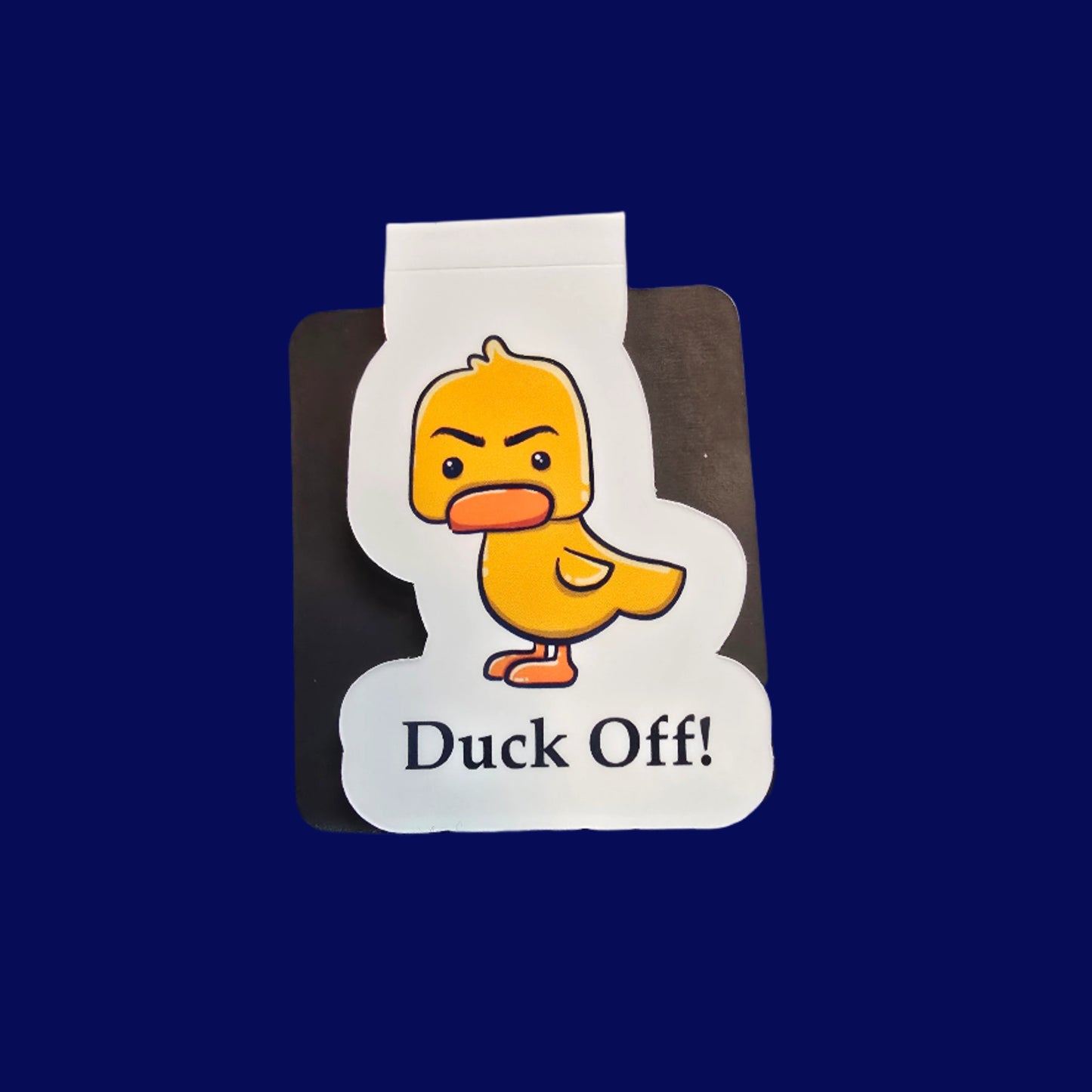 Cartoon duck sticker with text 'Duck Off!' on a reflective surface.