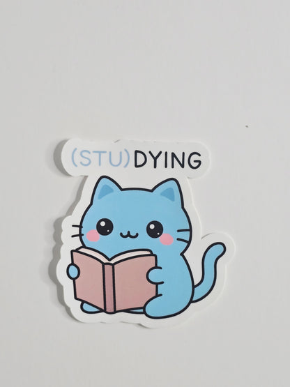 (STU)DYING Blue Cat Sticker – Funny Kawaii Study Cat Vinyl Sticker – 3" Die-Cut, Water-Resistant Student Gift