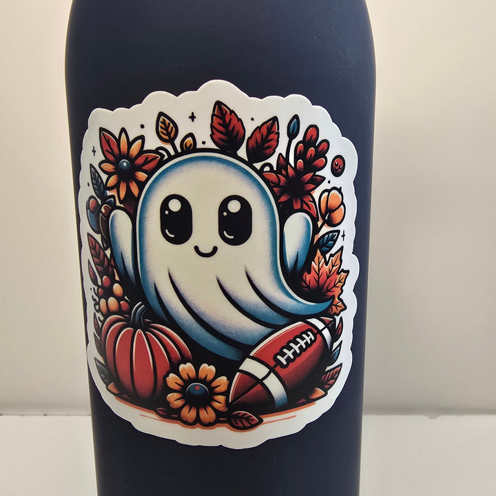 Football Fall Ghost Sticker – Cute Halloween Vinyl Die-Cut | 3" Autumn Ghost with Pumpkins &amp; Football - Designs by Mysh