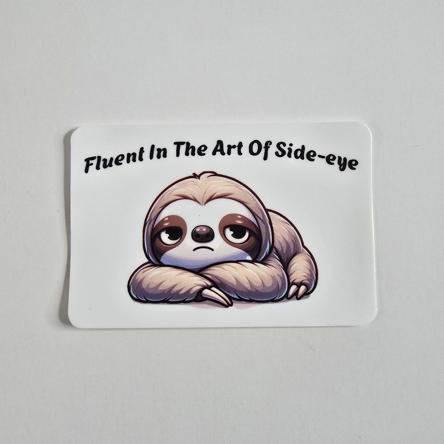 "Fluent in the Art of Side-Eye" Sloth Sticker – Funny Cute Animal Vinyl Decal (3")