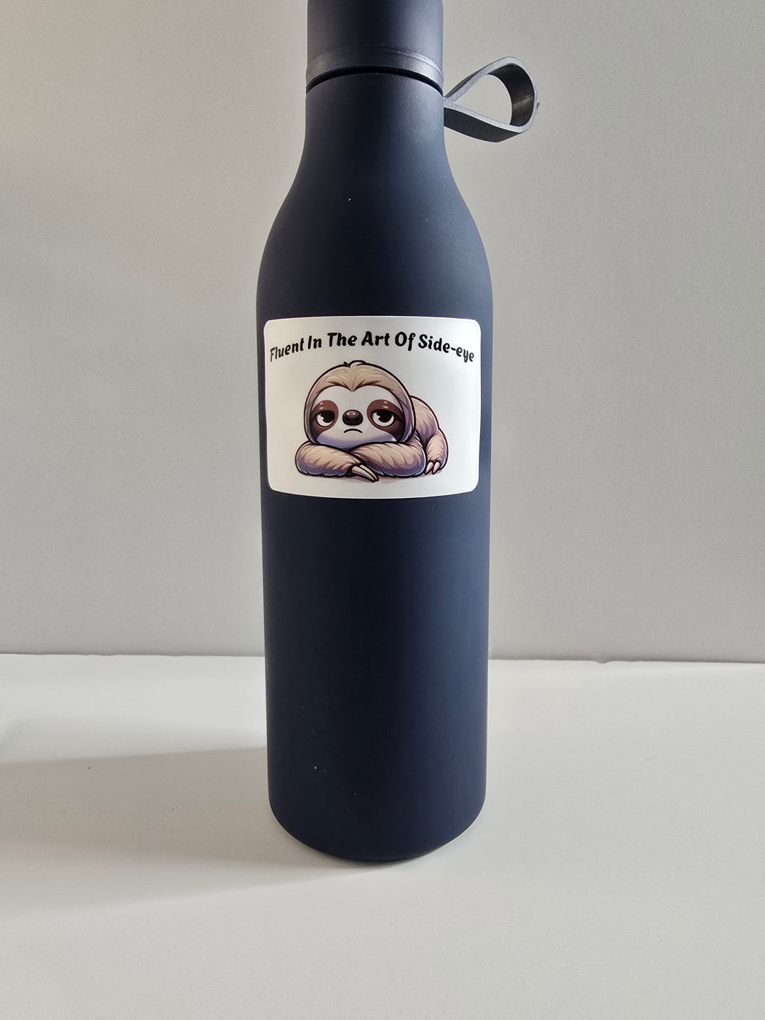 "Fluent in the Art of Side-Eye" Sloth Sticker – Funny Cute Animal Vinyl Decal (3") - Designs by Mysh