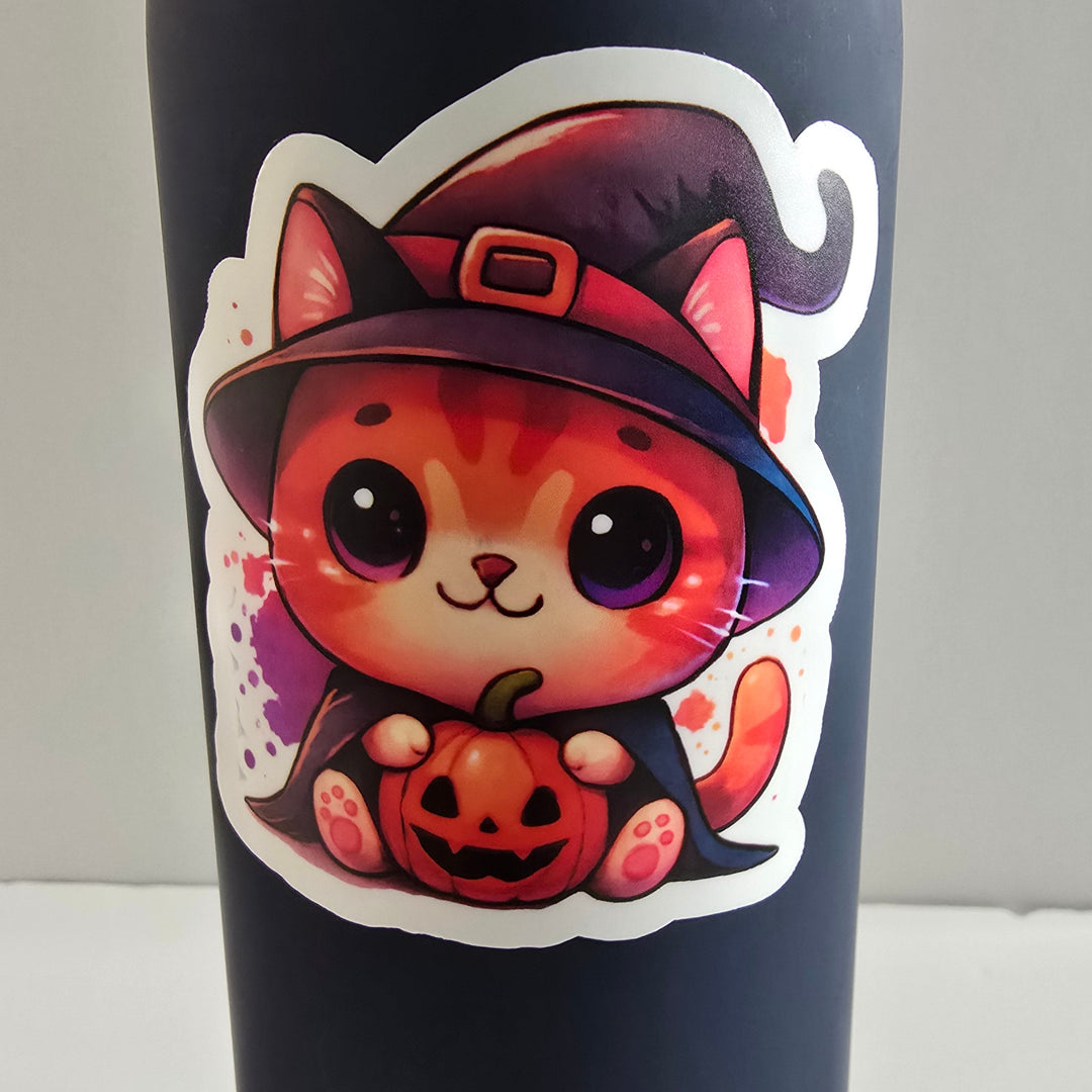 Halloween Witch Cat Sticker – Cute Orange Kitty with Pumpkin | 3-Inch Vinyl Die Cut - Designs by Mysh