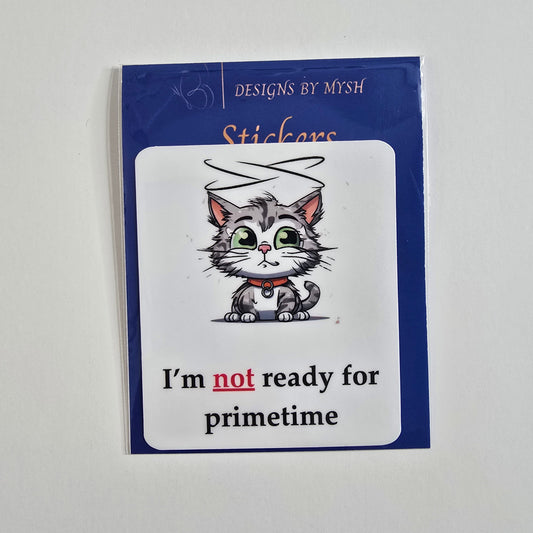 Cartoon sticker of a halo-wearing gray tabby cat with the caption "I'm not ready for primetime."