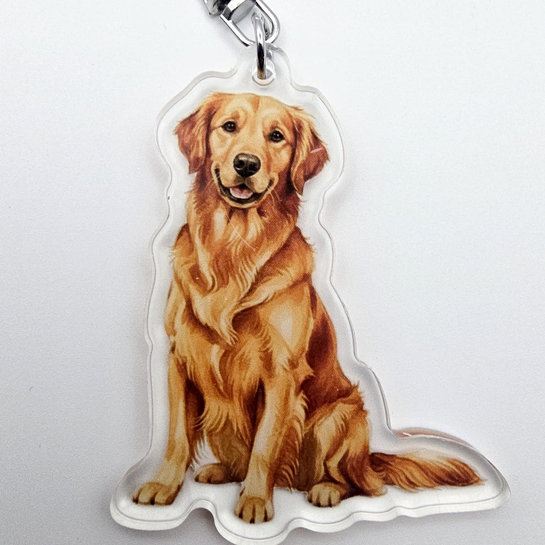 Dog-shaped keychain with a golden retriever design on a white background