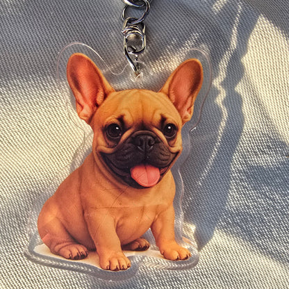 Fawn French Bulldog acrylic keychain with tongue out and lobster clasp on fabric background