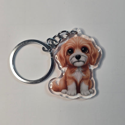 Keychain with a dog design on a gray background