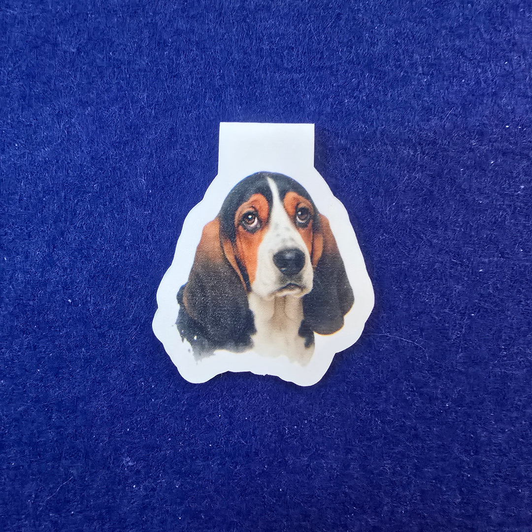Sticker of a dog's face on a blue textured background