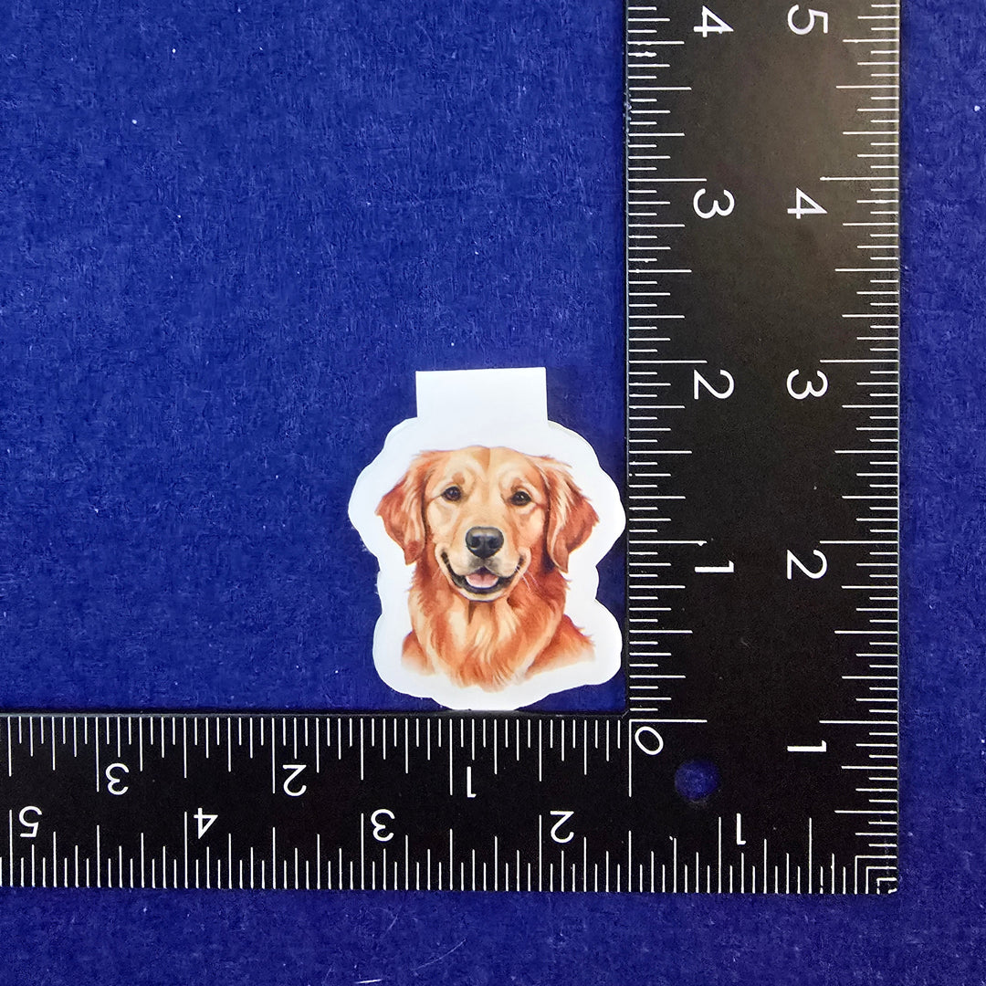 Sticker of a dog on a blue background with a ruler for scale.