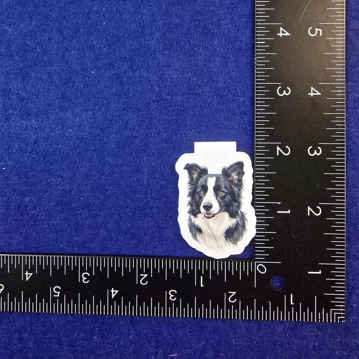 Sticker of a dog on a blue background with a ruler for scale.