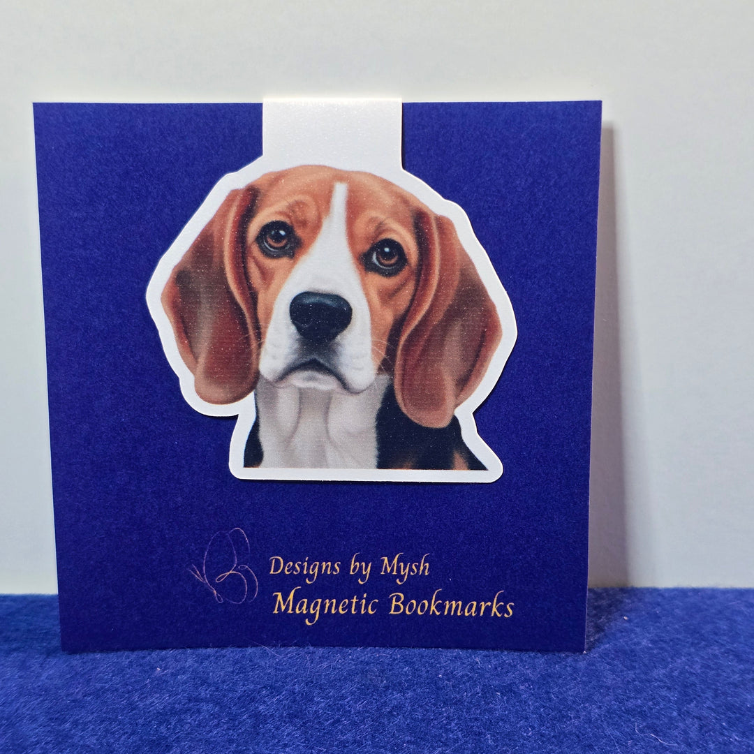 Magnetic bookmark with a dog illustration on a blue background