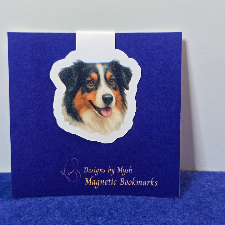 Blue magnetic bookmark with a dog illustration on a white background