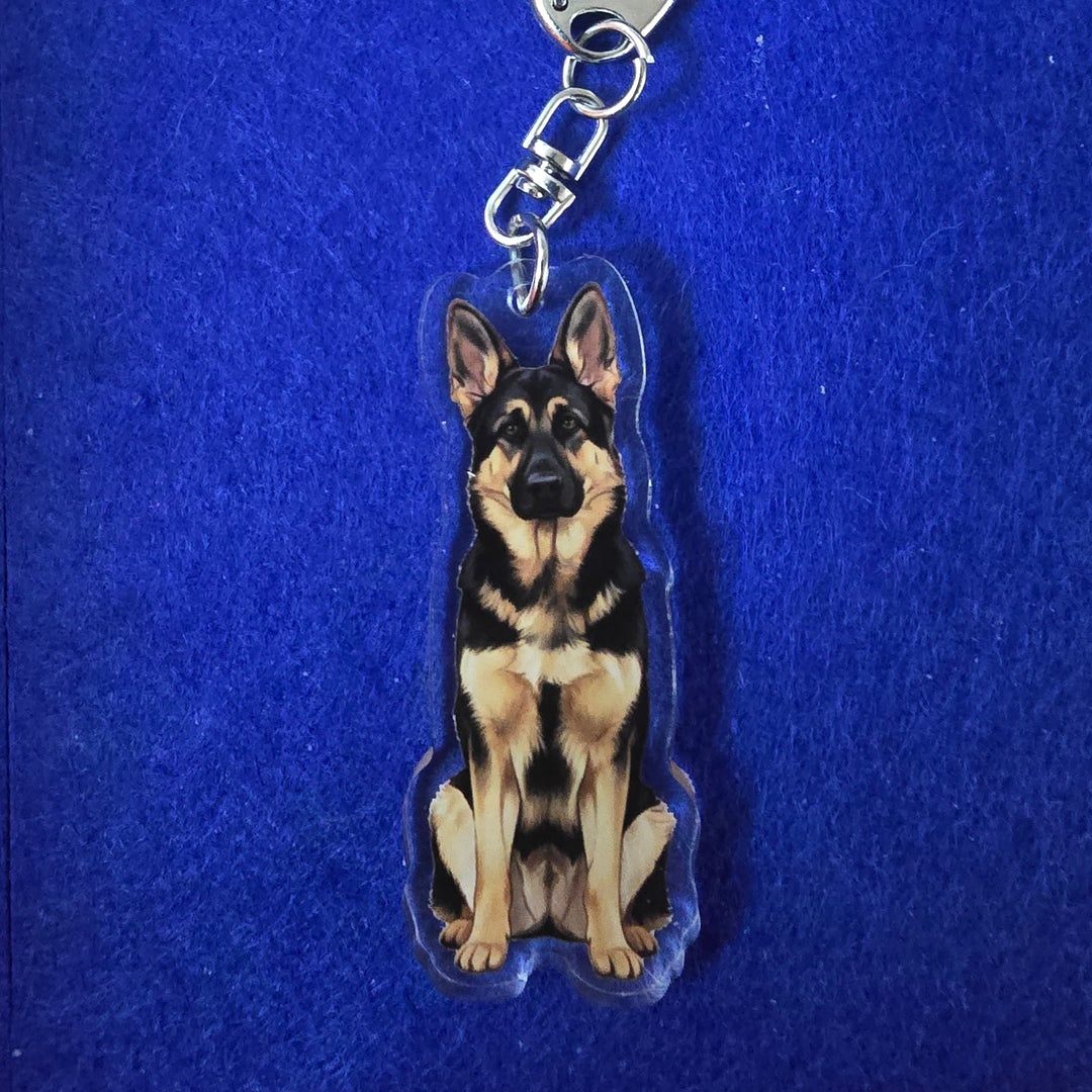 Dog-shaped keychain on a blue background