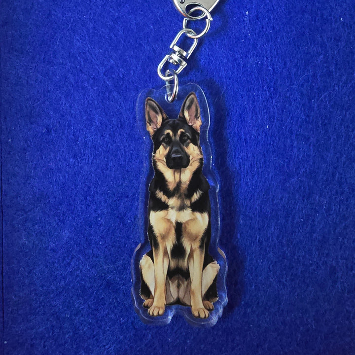 Dog-shaped keychain on a blue background