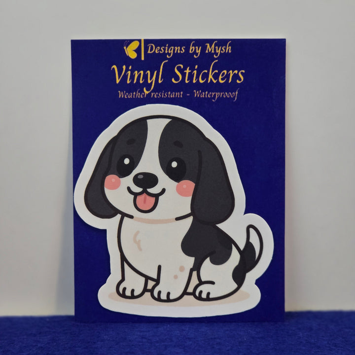 Black and White Basset Hound kawaii style sticker on a blue background.