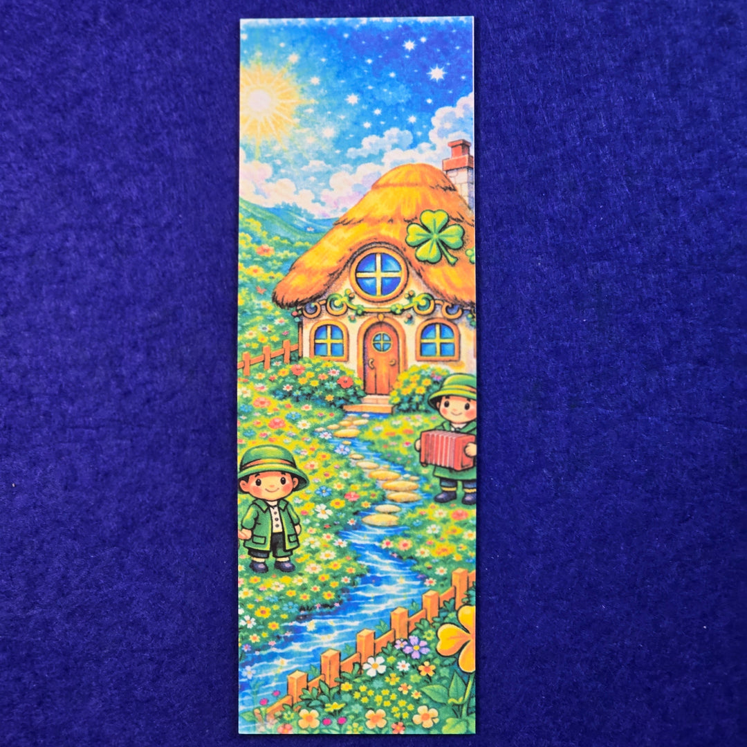 Bookmark with a colorful illustration of a thatched-roof house and two children on a blue background
