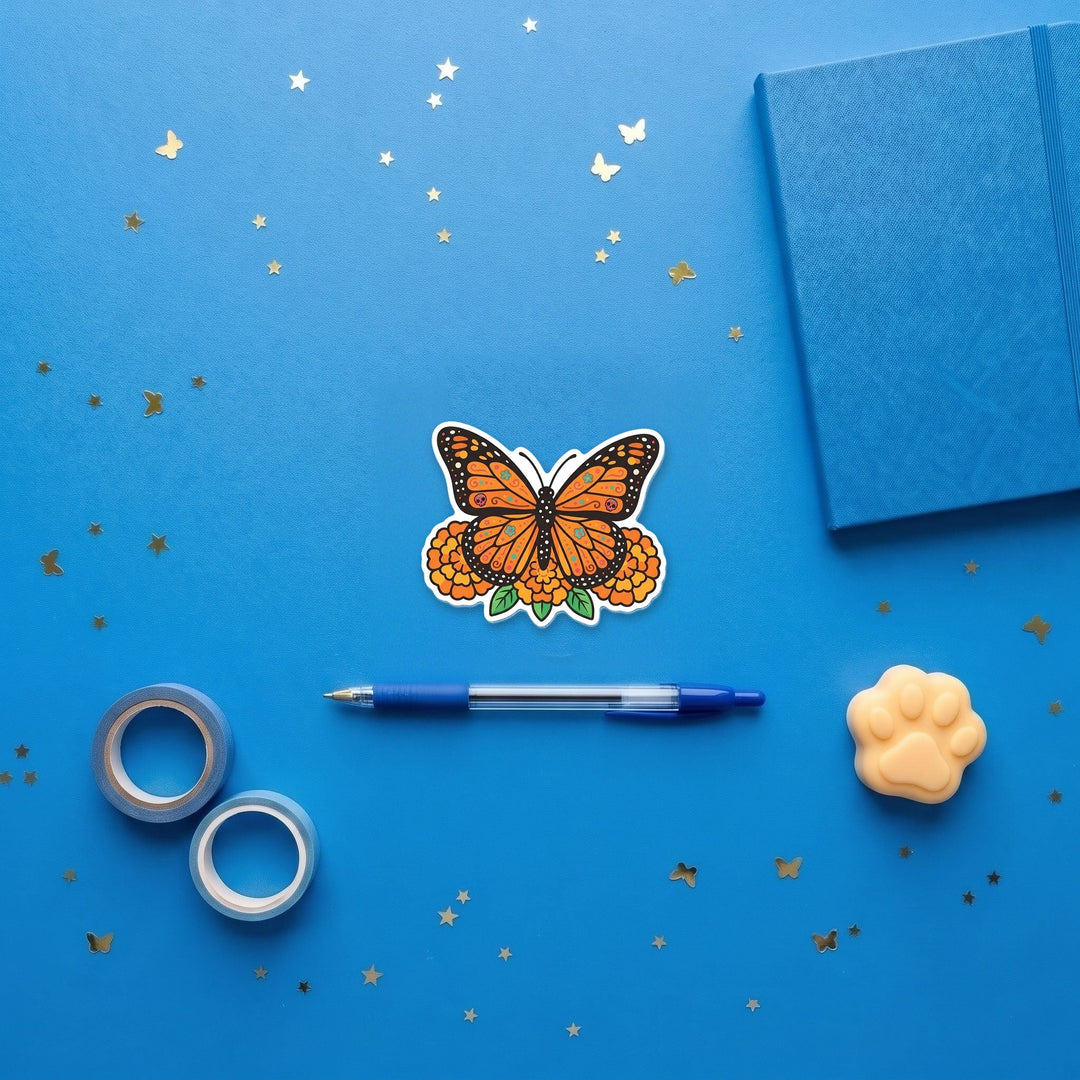 Monarch Butterfly 3 inch fridge magnet flat lay with blue stationery