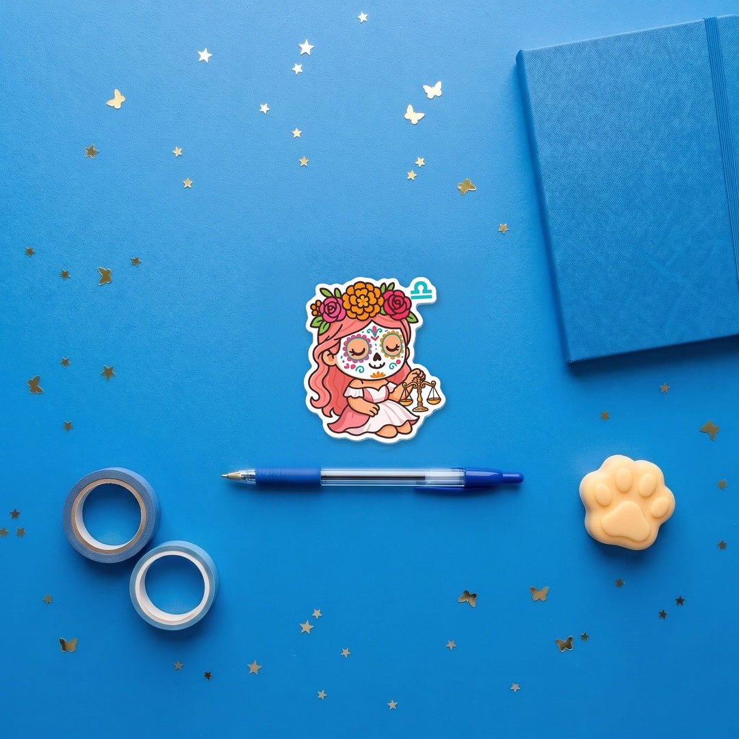 Libra Sugar Skull Girl 3 inch fridge magnet flat lay with blue stationery
