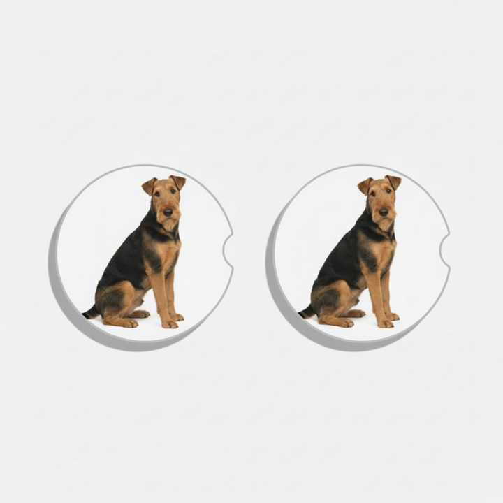 Two circular dog-themed coasters with a sitting dog design on a white background