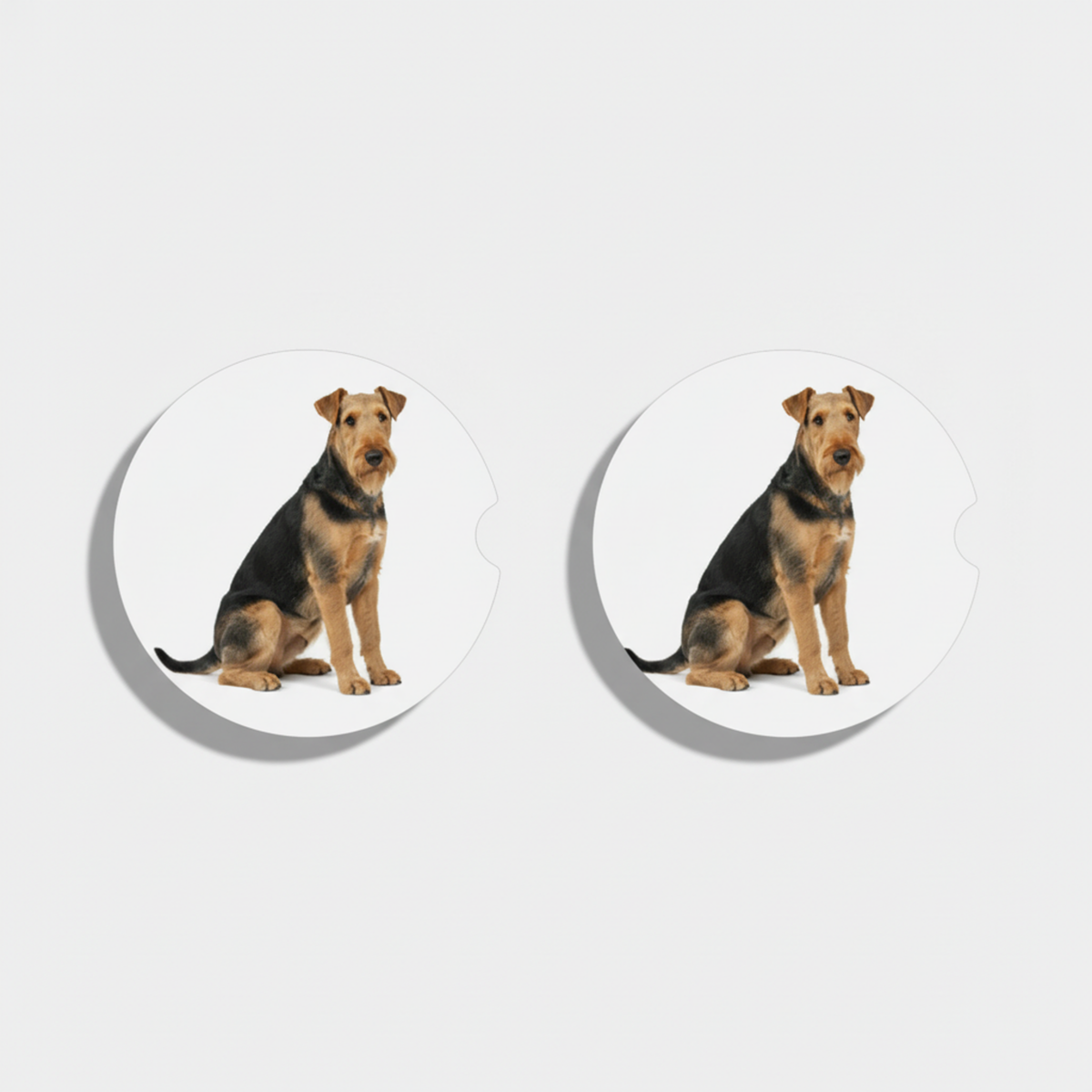 Pair of dog-themed earrings on a white background