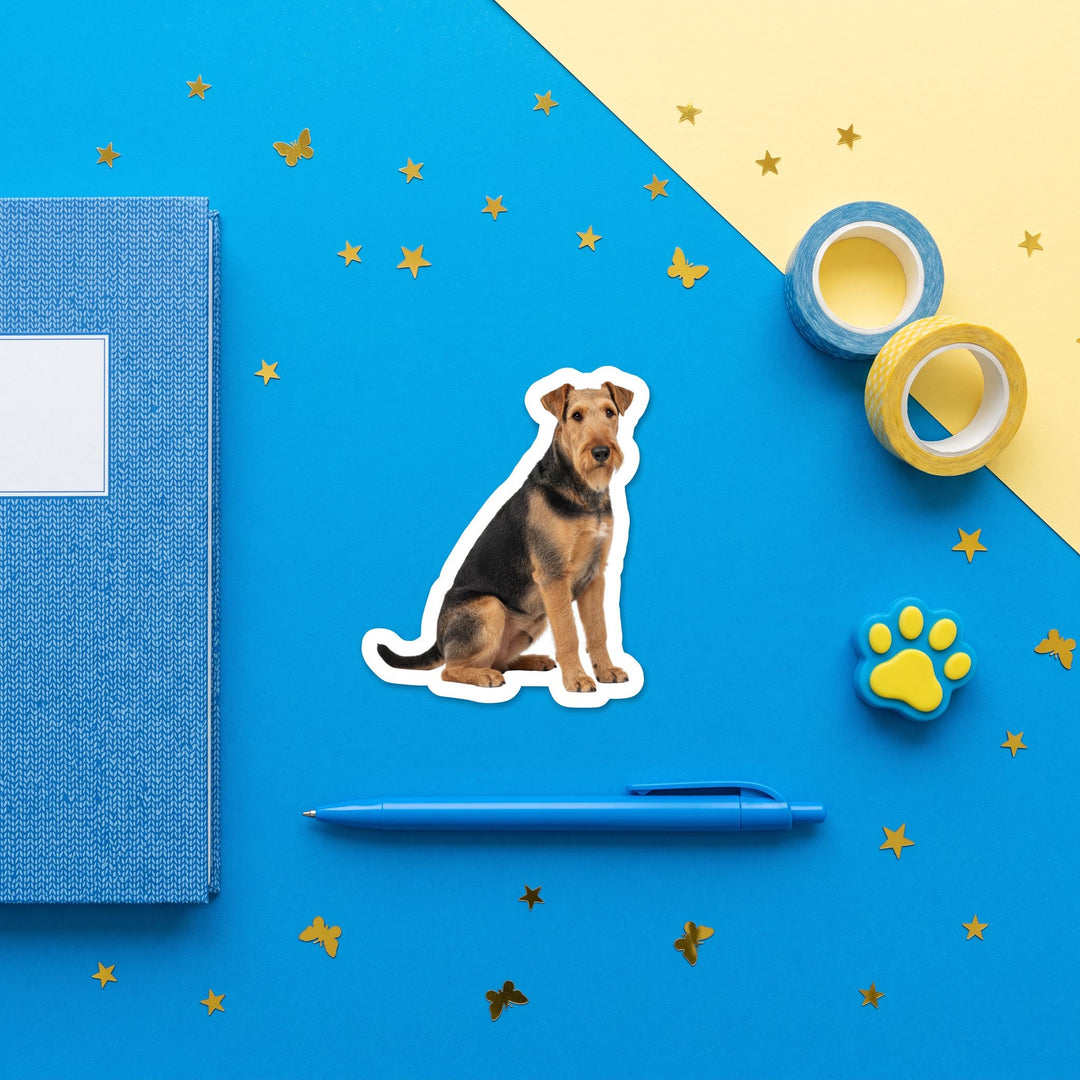Airedale Terrier Grizzle Tan Sticker brand flat lay - Designs by Mysh