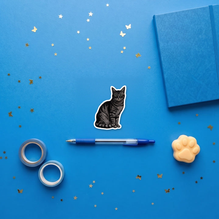 American Shorthair Black Tabby watercolor 3 inch flexible magnet flat lay with blue stationery – Designs by Mysh