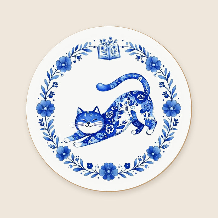 Blue Folk Art Cat round ceramic coaster with a floral wreath and open book – Designs by Mysh