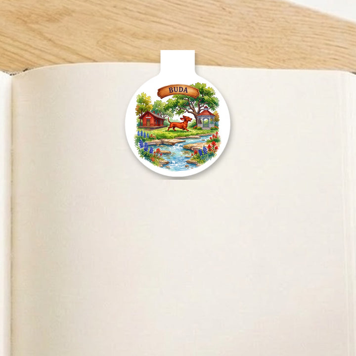 Buda, Texas watercolor magnetic bookmark clipped on an open book – Designs by Mysh