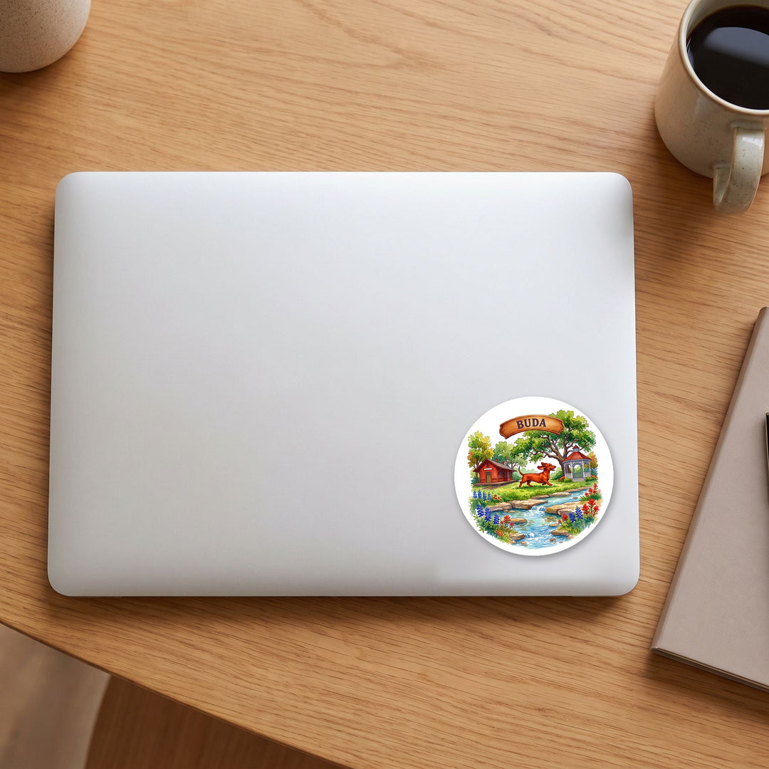 Buda, Texas watercolor vinyl sticker on a laptop lid – Designs by Mysh