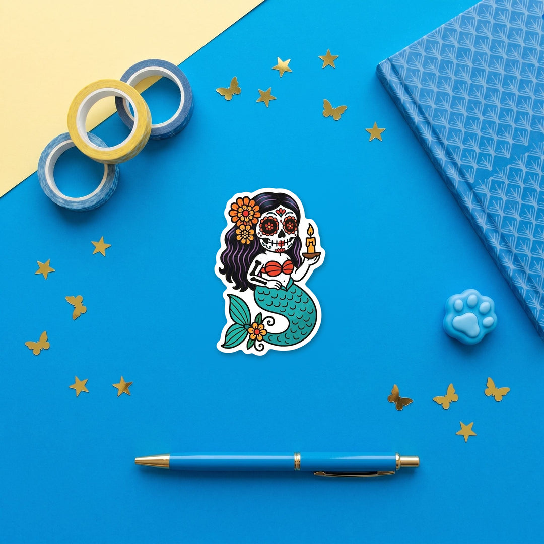 Candle sugar skull mermaid 3 inch sticker flat lay with blue stationery – Designs by Mysh