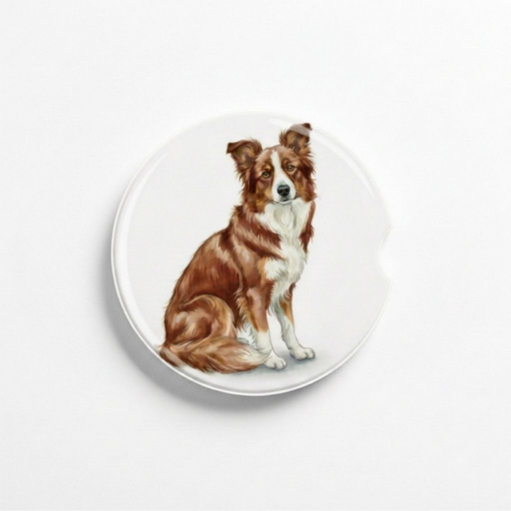 Single round ceramic car coaster featuring a watercolor-style illustration of a Border Collie with a red merle coat, sold individually.