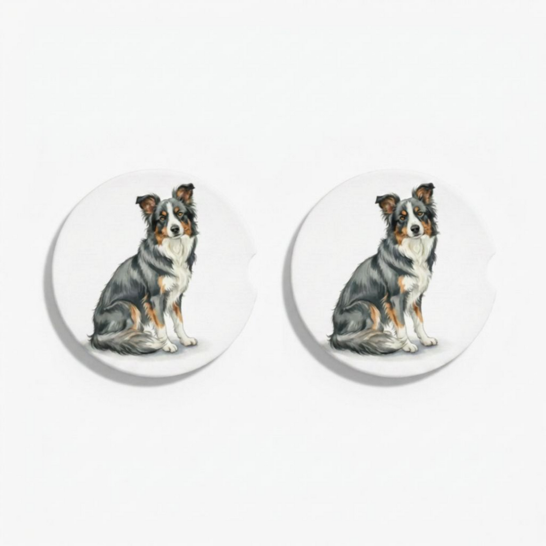 Set of two round ceramic car coasters featuring a watercolor-style illustration of a Border Collie with a blue tri-color coat.