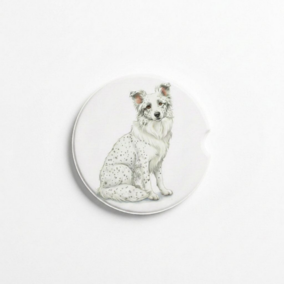Single round ceramic car coaster featuring a watercolor-style illustration of a Border Collie with a white coat with ticking, sold individually.